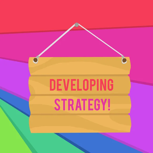 Word schrijven van tekst ontwikkelen strategie. Business concept voor organisaties proces veranderingen te bereiken doelstellingen hook up lege bord. Lege houten bord met Lope voor hang. — Stockfoto