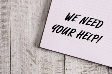 Kavramsal el yazma sizin yardımınıza Ihtiyacımız olduğunu gösteriyor. İş fotoğrafı size zorluk karşı stand birisi soran vitrine Notebook sabit klasik ahşap zemin üzerine yerleştirilen.