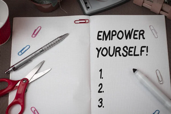 Text sign showing Empower Yourself. Conceptual photo taking control of our life setting goals and making choices Scissors and writing equipments plus math book above textured backdrop. — Stock Photo, Image