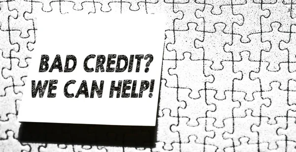 Word writing text Bad Credit Question We Can Help. Business concept for offering help after going for loan then rejected Piece of square note paper use for give notation stick to puzzle background.
