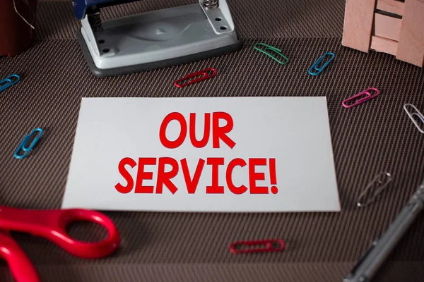 Text sign showing Our Service. Conceptual photo announcing as repair or provide maintenance for product Scissors and writing equipments plus plain sheet above textured backdrop.