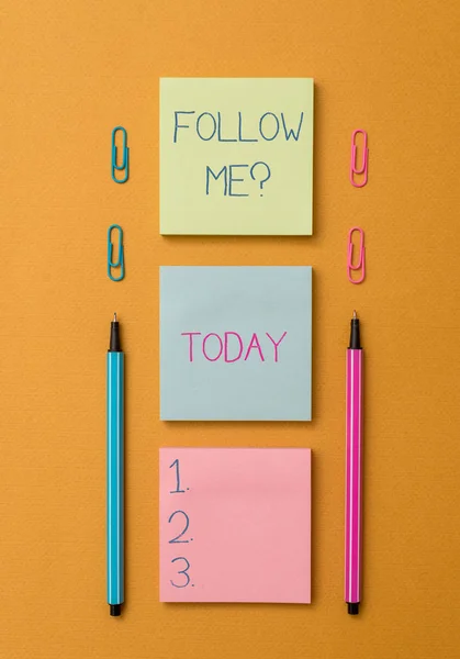 Word writing text Follow Me Question. Business concept for go or come after demonstrating or thing proceeding ahead Front view blank colored sticky note two ballpoints clips yolk background. — Stock Photo, Image