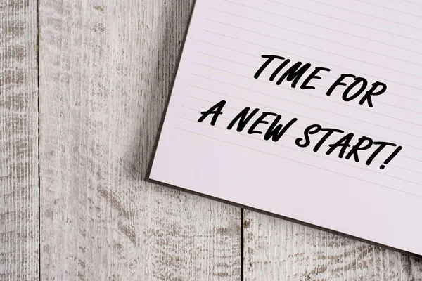 Conceptual hand writing showing Time For A New Start. Business photo showcasing something is supposed to begin right now Fresh job Notebook stationary placed above classic wooden backdrop.