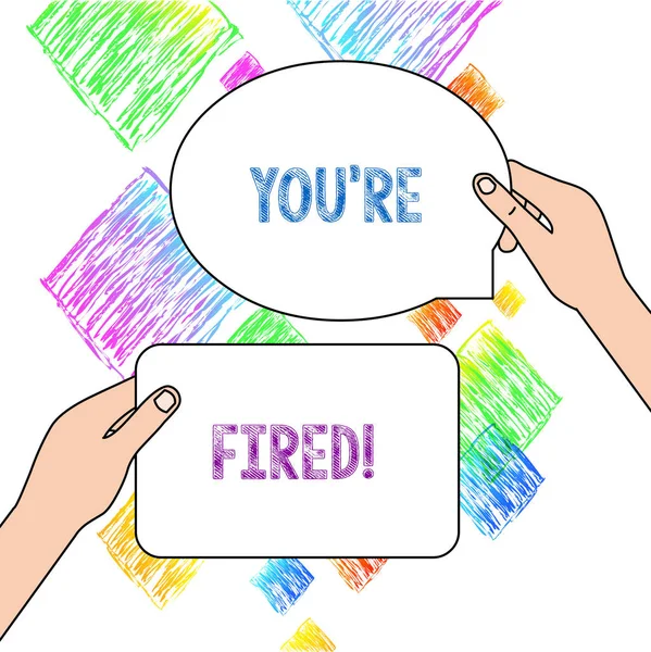 Text sign showing You Re Fired. Conceptual photo Used by boss indicate employee that he is discharged from job Two Blank Figured Tablets Signs Held in Hands One Above Other Text Space.