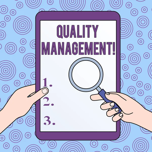Conceptual hand writing showing Quality Management. Business photo showcasing Maintain Excellence Level High Standard Product Services Hands Holding Magnifying Glass Against Switched Off Tablet. — Stock Photo, Image