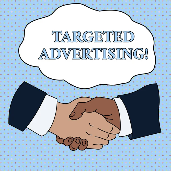 Word writing text Targeted Advertising. Business concept for Online Advertisement Ads based on consumer activity Hand Shake Multiracial Male Business Partners Colleagues Formal Shirt Suit.