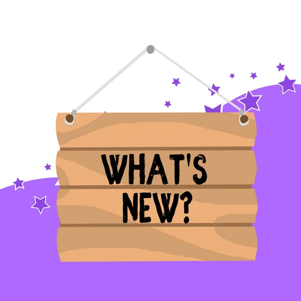 Handwriting text What S New Question. Concept meaning Asking about latest Updates Trends Happening News Hook Up Blank Sign Plate. Empty Wooden Signboard with Lope for Hang.