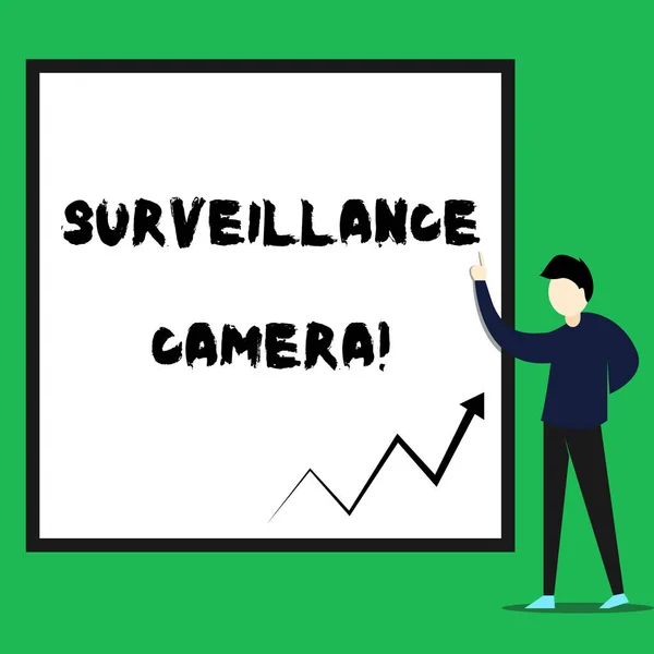 Writing note showing Surveillance Camera. Business photo showcasing Closed Circuit Television transmit signal on monitors Young man standing pointing up rectangle Geometric background. — Stock Photo, Image