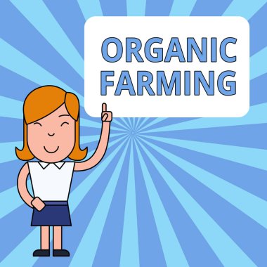 Organik Tarım 'ı gösteren bir not yazıyorum. Sürdürülebilirlik için çabalayan bütünleşik bir tarım sistemini gösteren iş fotoğrafında Sol İşaretli Parmak İzi Boş Metin Kutusunu Gösteren Kadın.