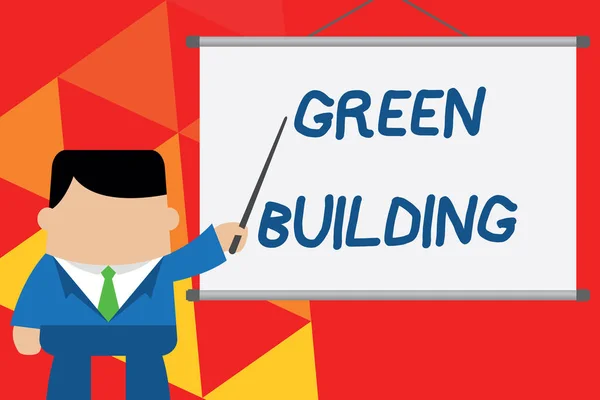 Εννοιολογική γραφή στα χέρια που δείχνει το πράσινο κτίριο. Φωτογραφικό κείμενο επιχείρησης μια δομή που είναι περιβαλλοντικά υπεύθυνη βιώσιμος επιχειρηματίας στέκεται μπροστά προβολέα ιδέα έργο. — Φωτογραφία Αρχείου