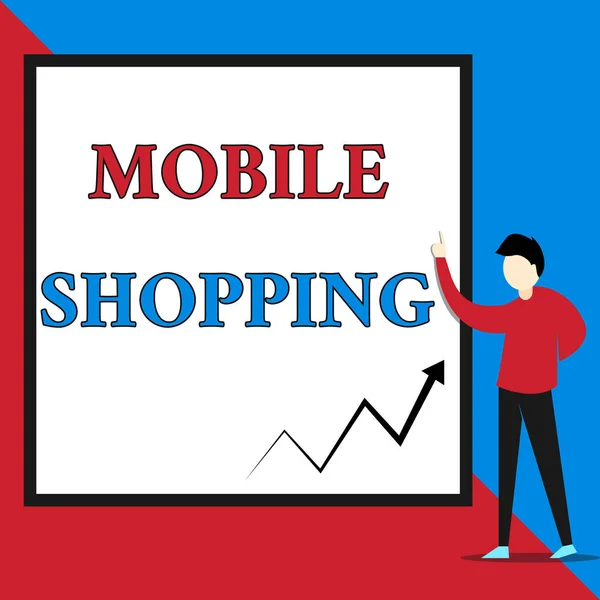 Text sign showing Mobile Shopping. Conceptual photo Buying and selling of goods and services through mobile View young man standing pointing up blank rectangle Geometric background. — Stock Photo, Image