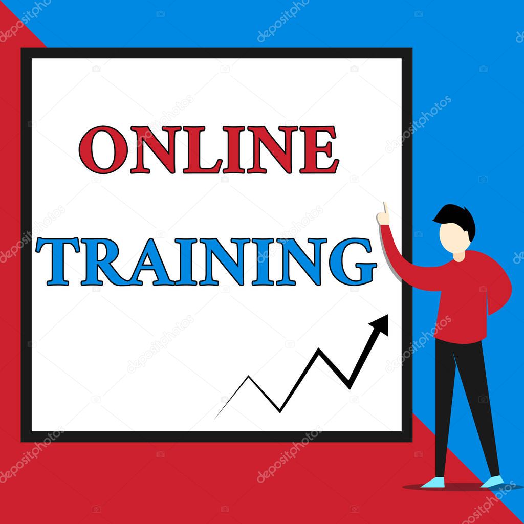 Text sign showing Online Training. Conceptual photo Take the education program from the electronic means View young man standing pointing up blank rectangle Geometric background.