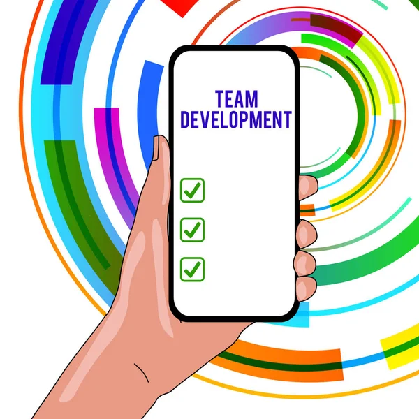 Handwriting text writing Team Development. Concept meaning learn why and how small groups change over time with graphs Closeup of Smartphone Device Held in Hand with Empty Screen and Text Space. — Stock Photo, Image