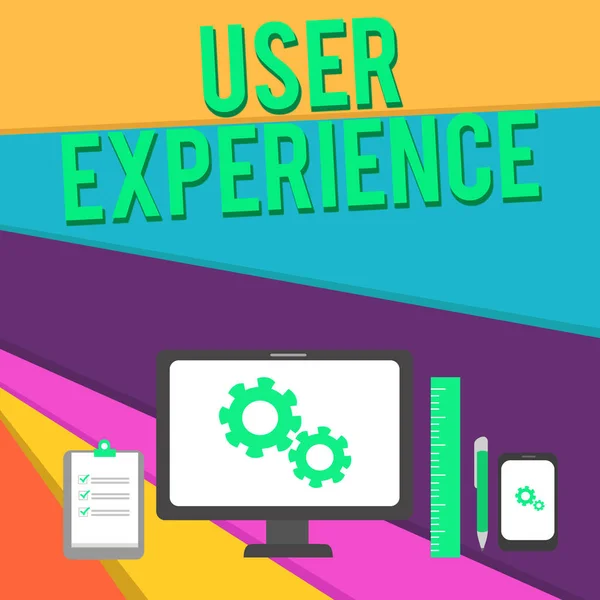 Texto de escritura de palabras User Experience. Concepto de negocio para el uso del sitio web, especialmente en términos de lo agradable que es utilizar el concepto de negocio PC Monitor Dispositivo móvil Portapapeles Regla Bolígrafo . —  Fotos de Stock