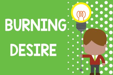 Text sign showing Burning Desire. Conceptual photo Extremely interested in something Wanted it very much Standing man tie holding plug socket light bulb to connect idea. Startup.