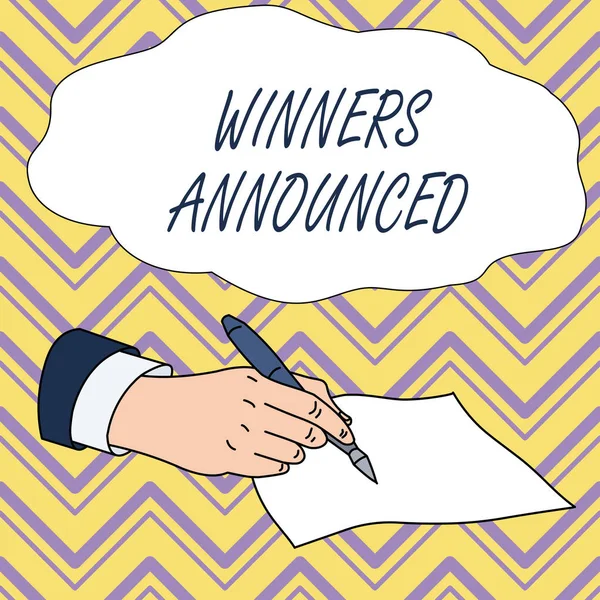 Conceptual hand writing showing Winners Announced. Business photo text Announcing who won the contest or any competition Male Hand Formal Suit Holding Ballpoint Pen Piece of Paper Writing.