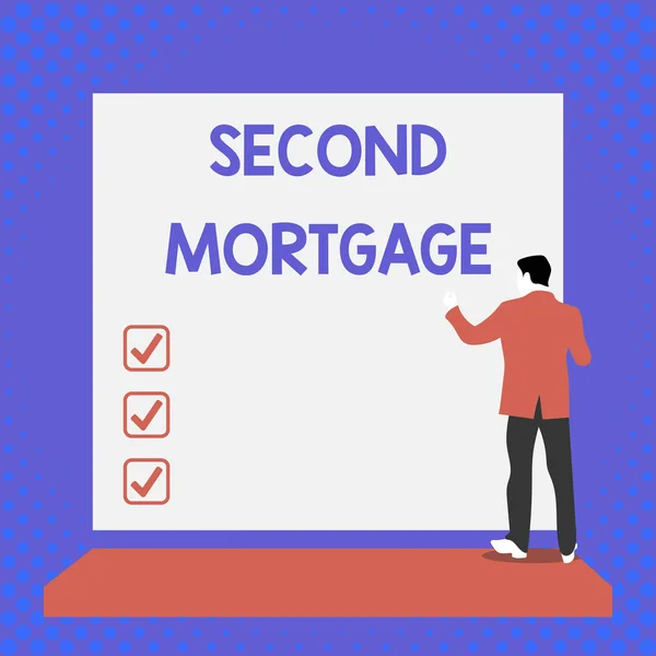 Text sign showing Second Mortgage. Conceptual photo lien on property which is subordinate to more senior one Back view young man dressed suit standing platform facing blank rectangle.