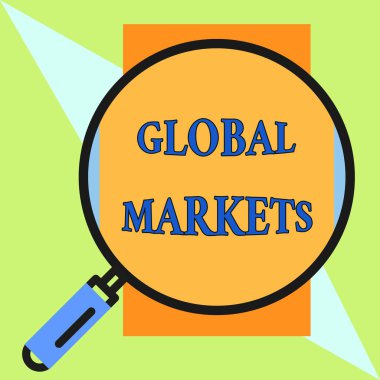 El yazısı metin Global Markets. Kavram anlamı Dünyanın tüm ülkelerinde mal ve hizmetlerin ticareti Nesneyi daha büyük göstermek için demir saplı çerçeveli büyüteç.