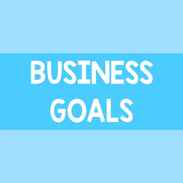 Writing note showing Business Goals. Business photo showcasing Expectation to accomplish over a specific period of time Square rectangle paper sheet loaded with full creation of pattern theme.