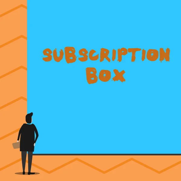 Text sign showing Subscription Box. Conceptual photo button if you clicked on will get news or videos about site Man stands in back view in front of huge empty blank big rectangle board.