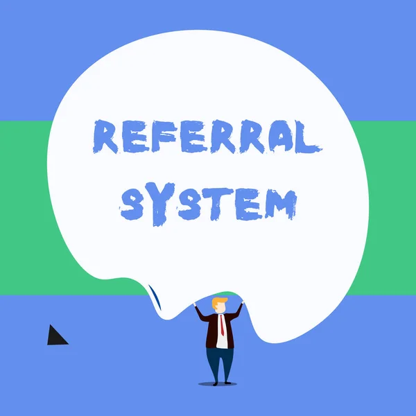 Text sign showing Referral System. Conceptual photo sending own patient to another physician for treatment Front view standing man dressed suit tie two hands up big deflated balloon. — Stock Photo, Image