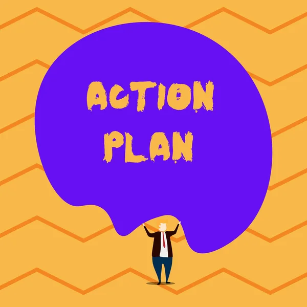 Text sign showing Action Plan. Conceptual photo proposed strategy or course of actions for certain time Male human wear formal tuxedo hold asymmetrical shape bubble use both hands.