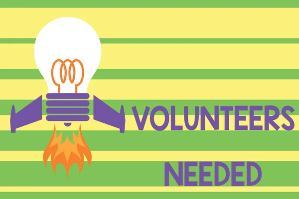 Writing note showing Volunteers Needed. Business photo showcasing need work or help for organization without being paid Top view launching bulb rocket fire base Project Fuel idea.