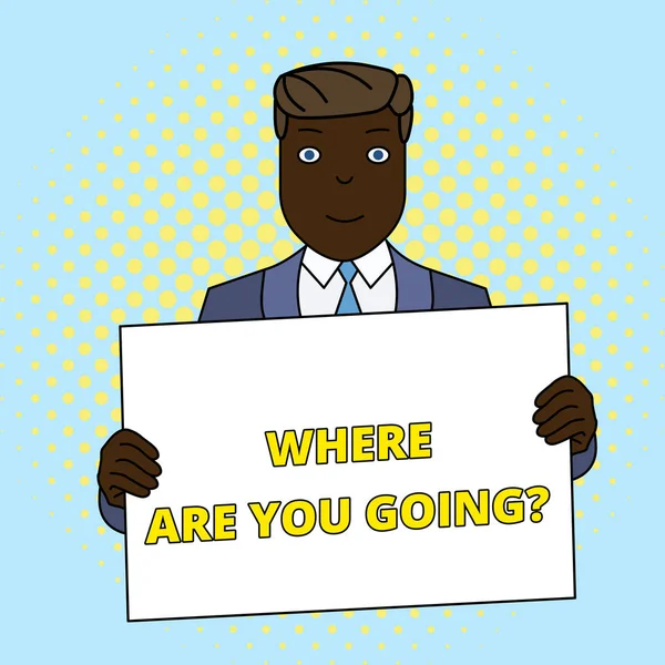 Handwriting text Where Are You Goingquestion. Concept meaning used to ask someone the destination headed to Smiling Man Holding Formal Suit Big Blank Poster Board in Front of Himself.