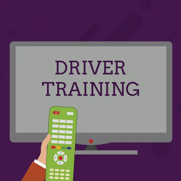 Word writing text Driver Training. Business concept for prepares a new driver to obtain a driver s is license Hand Holding Computer Remote Control infront of Blank Wide Color PC Screen. — 스톡 사진