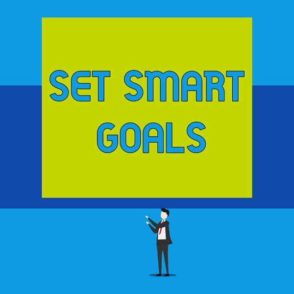 Word writing text Set Smart Goals. Business concept for giving criteria to guide in the setting of objectives Isolated view young man standing pointing upwards two hands big rectangle.