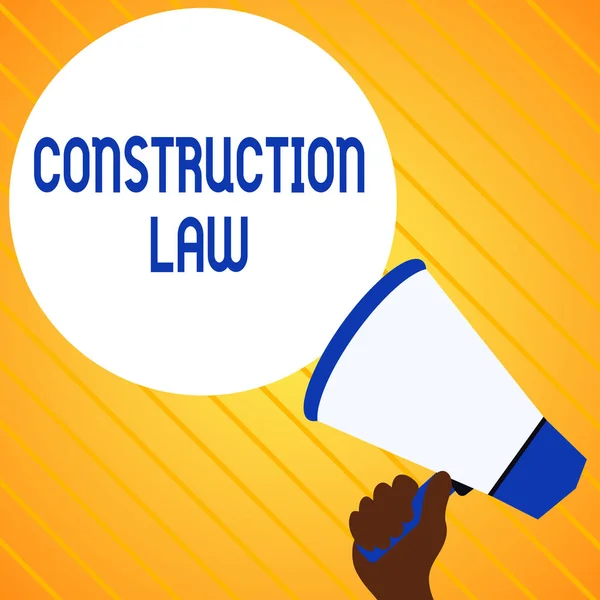 Text sign showing Construction Law. Conceptual photo deals with matters relating to building and related fields Hand Holding Loudhailer Empty Round Speech Text Balloon Announcement New. — Φωτογραφία Αρχείου