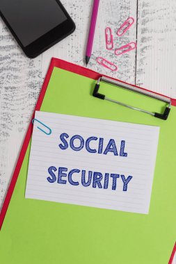 Writing note showing Social Security. Business photo showcasing assistance from state showing with inadequate or no income Clipboard sheet pencil smartphone squared note clips wooden background. clipart