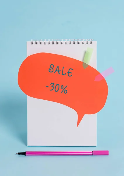 Conceptual hand writing showing Sale 30 Percent. Business photo text A promo price of an item at 30 percent markdown Spiral notepad speech bubble arrow pen lying pastel background. — Stock Photo, Image