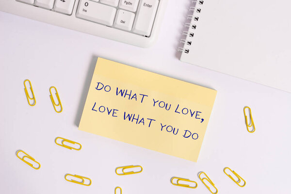 Conceptual hand writing showing Do What You Love Love What You Do. Business photo showcasing Pursue your dreams or passions in life.