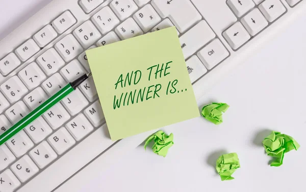 Word writing text And The Winner Is. Business concept for announcing a demonstrating or thing that wins something. — Stock Photo, Image