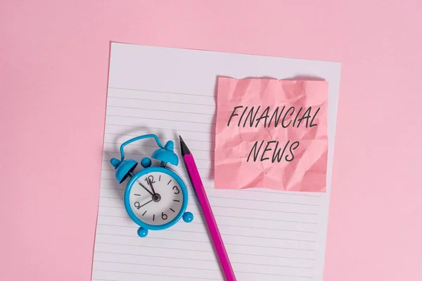 Writing note showing Financial News. Business photo showcasing Investment banking Fund analysisagement Regulation and trading Striped paper sheet note pencil vintage alarm clock colored background. — Stock Photo, Image
