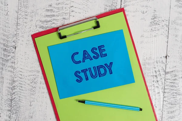 Text sign showing Case Study. Conceptual photo analysis and a specific research design for examining a problem Colored clipboard blank paper sheet marker sticky note wooden background.