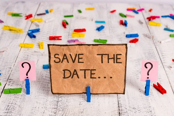 Conceptual hand writing showing Save The Date. Business photo text Organizing events well make day special event organizers Crumbling sheet with paper clips placed on the wooden table. — Stock Photo, Image
