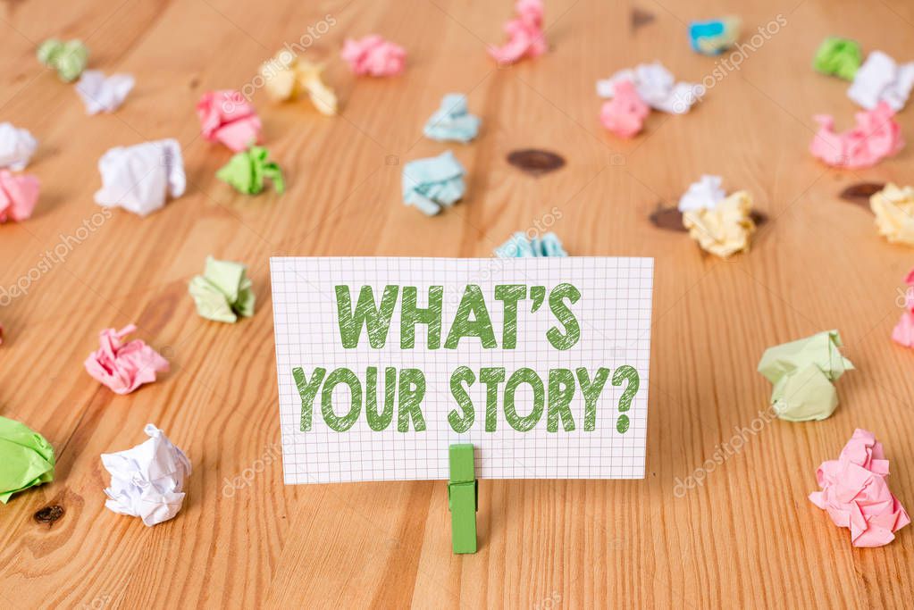 Conceptual hand writing showing What S Your Story Question. Business photo showcasing asking demonstrating about his past life actions events Colored crumpled papers wooden floor background clothespin