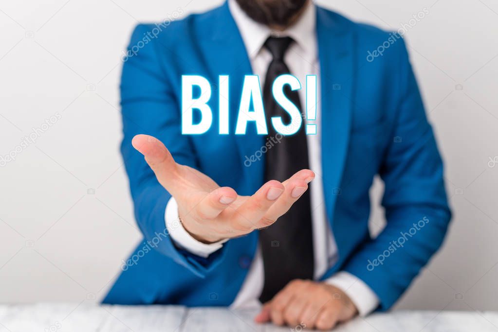 Text sign showing Bias. Conceptual photo inclination or prejudice for or against one demonstrating group Man holds empty paper with copy space in front of him Copy Space.