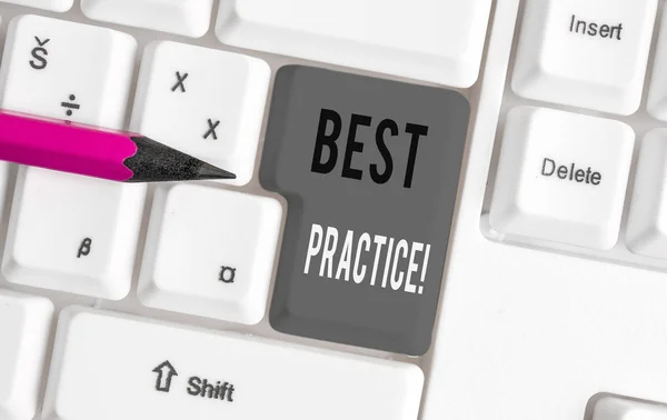 Handwriting text Best Practice. Concept meaning commercial procedures that are accepted prescribed being correct White pc keyboard with empty note paper above white background key copy space. — Stock Photo, Image