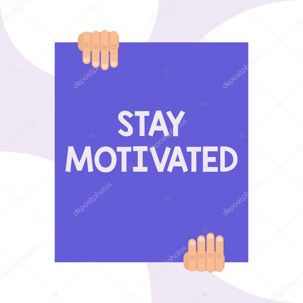 Handwriting text writing Stay Motivated. Concept meaning Reward yourself every time you reach a goal with knowledge Two hands holding big blank rectangle up down Geometrical background design.