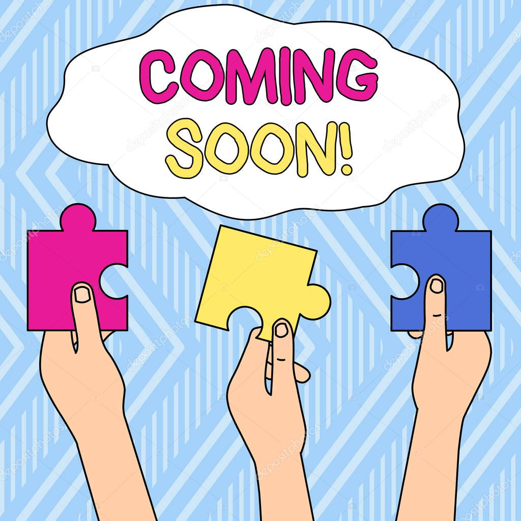 Writing note showing Coming Soon. Business photo showcasing event or action that will happen after really short time Three Colored Empty Jigsaw Puzzle Pieces Held in Different People Hands.