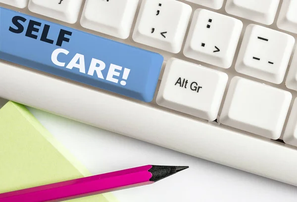Handwriting text writing Self Care. Concept meaning practice of taking action to preserve or improve ones own health White pc keyboard with empty note paper above white background key copy space. — Stock Photo, Image