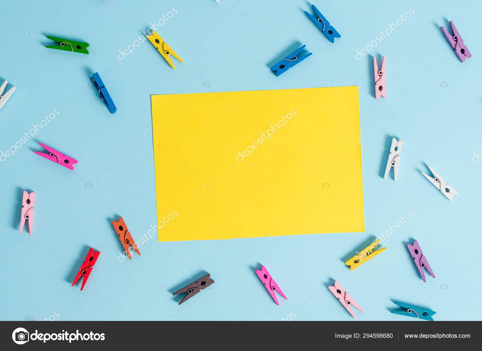 Rectangle square shaped colored paper in a light blue background