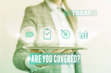 Kavramsal el yazısı gösteren Are You Covered Soru. İş veya yaşam da sigorta olup olmadığını gösteren iş fotoğrafı metin.