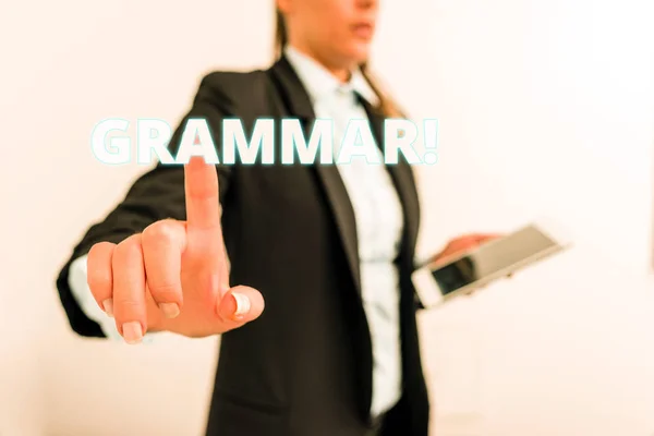 Conceptual hand writing showing Grammar. Business photo text whole system structure language syntax and morphology Digital business in black suite concept with business woman. — Stock Photo, Image