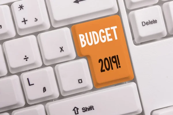Text sign showing Budget 2019. Conceptual photo estimate of income and expenditure for current year White pc keyboard with empty note paper above white background key copy space. — Stock Photo, Image
