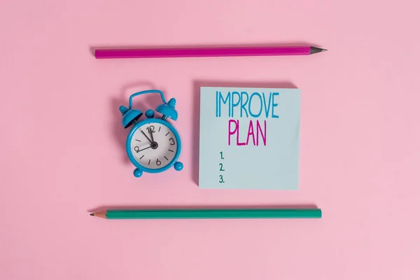 Handwriting text Improve Productivity. Concept meaning to increase the machine and process efficiency Metal vintage alarm clock wakeup blank notepad markers colored background. — Stock Photo, Image