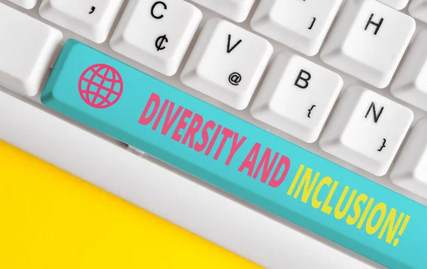Conceptual hand writing showing Diversity And Inclusion. Business photo showcasing range huanalysis difference includes race ethnicity gender White pc keyboard with note paper above the white